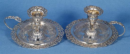 A nice pair of Victorian silver pierced chamber sticks, Diameter 4 ½”/115mm Height 2 ½”/64mm, Total weight 8.1oz/230 grms
